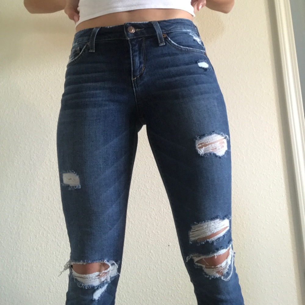 Dark-wash pair of JOE’S jeans, size W 24.